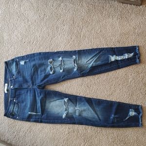 Distress jeans. Dark wash